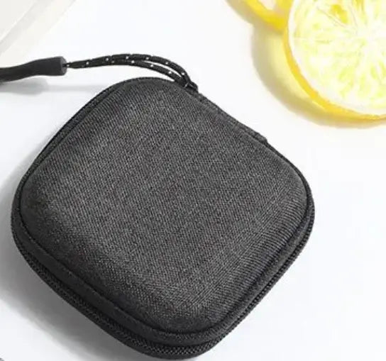 Shockproof Headphone Storage Bag with durable black exterior for audio accessories protection and organization.